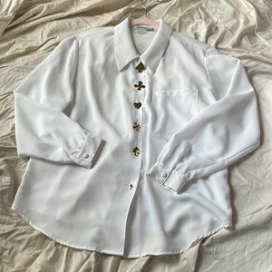 Button blouse with card suit buttons